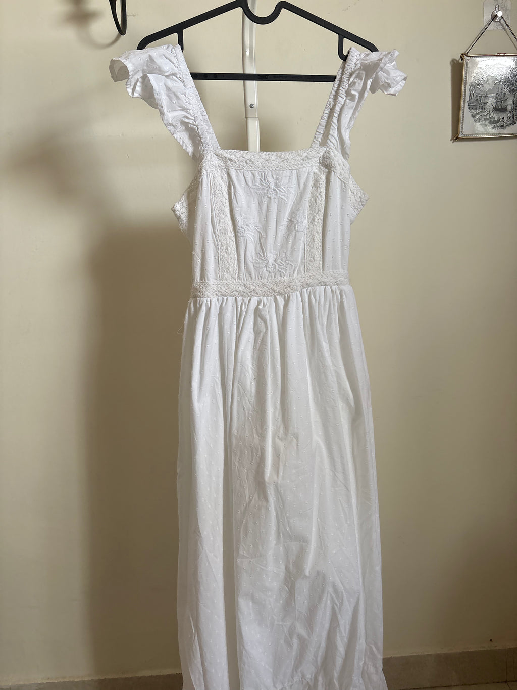AND NOW THIS EMBROIDERED DRESS S