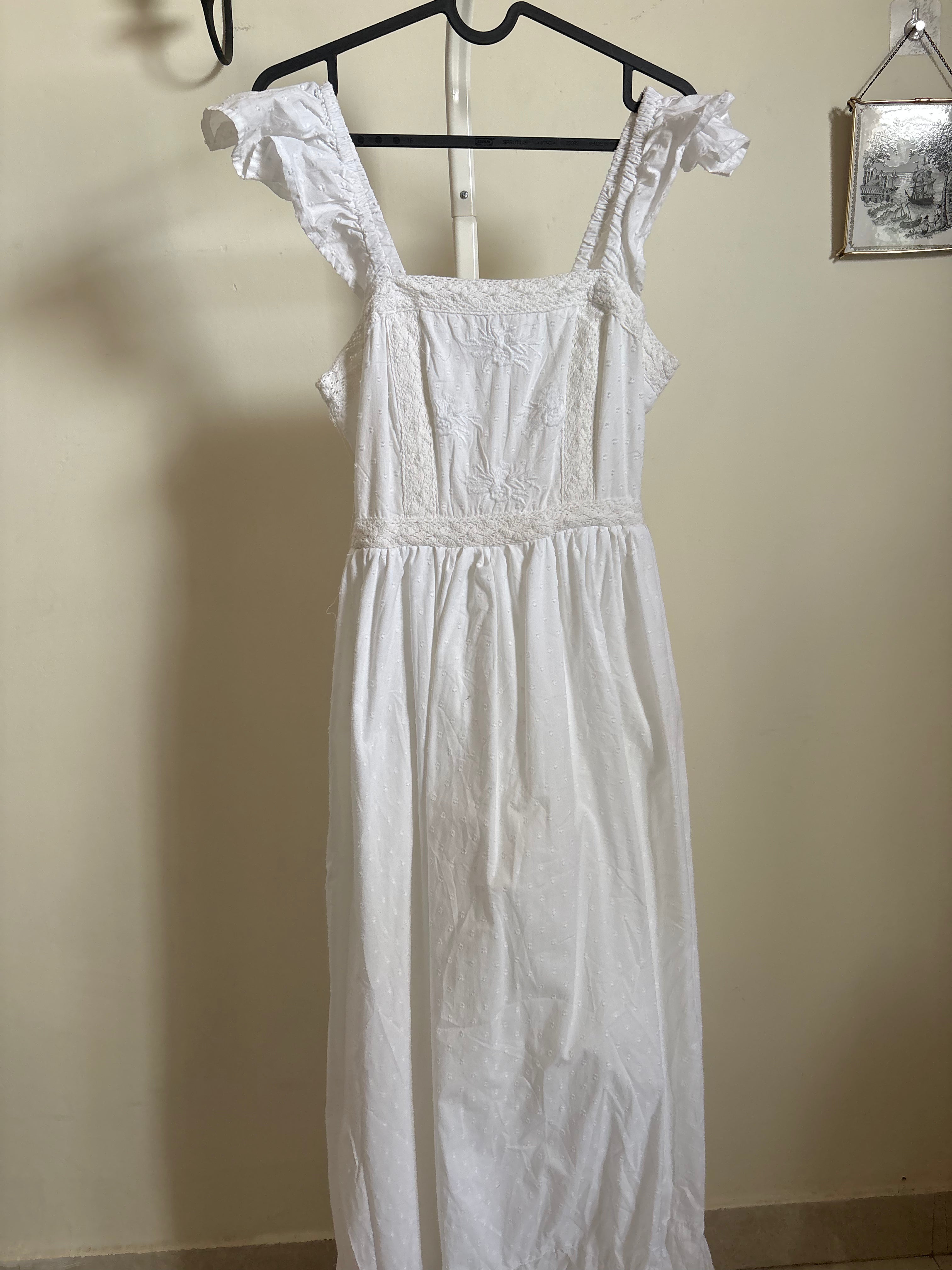 AND NOW THIS EMBROIDERED DRESS S