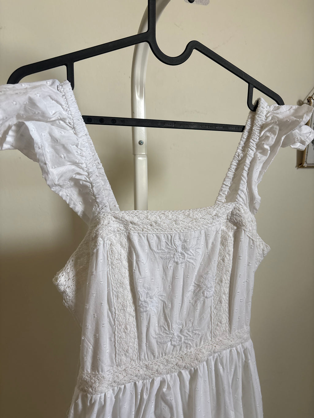 AND NOW THIS EMBROIDERED DRESS S