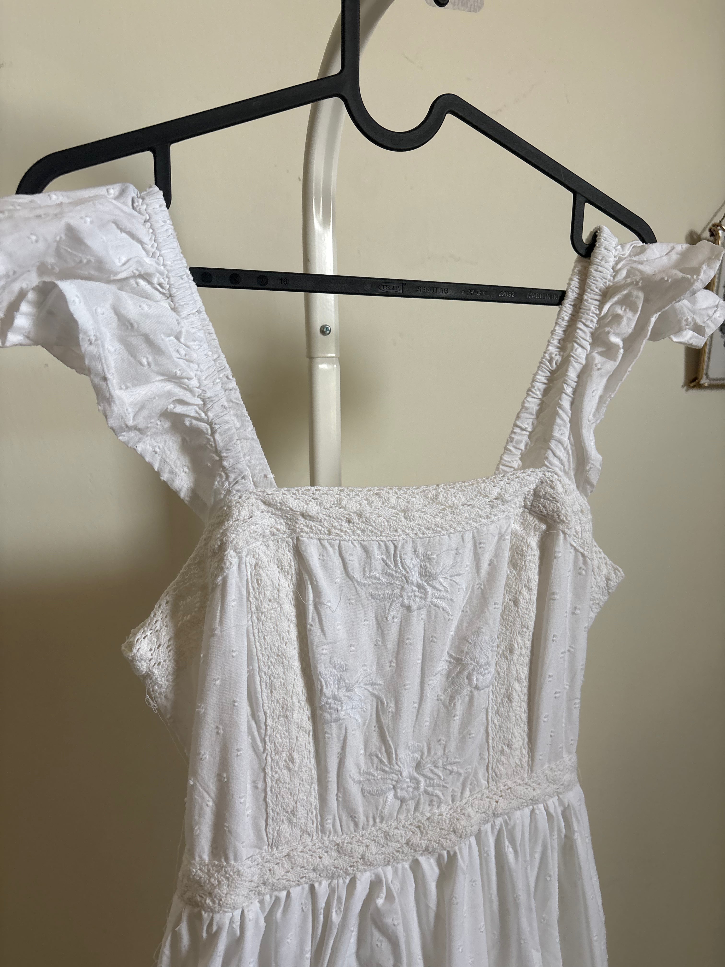 AND NOW THIS EMBROIDERED DRESS S